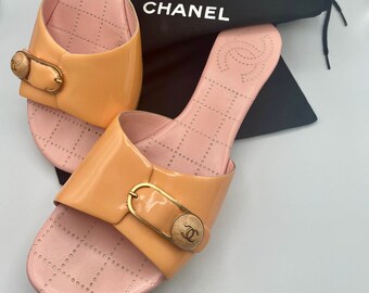 orange chanel jelly slides