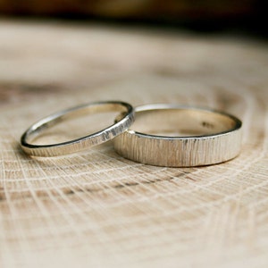 Handmade, sterling silver, wedding ring set featuring a tree bark texture. By Curious Magpie Jewellery.