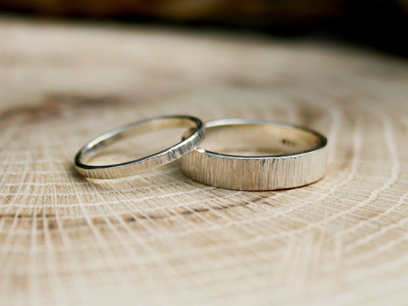 Handmade, sterling silver, wedding ring set featuring a tree bark texture. By Curious Magpie Jewellery.