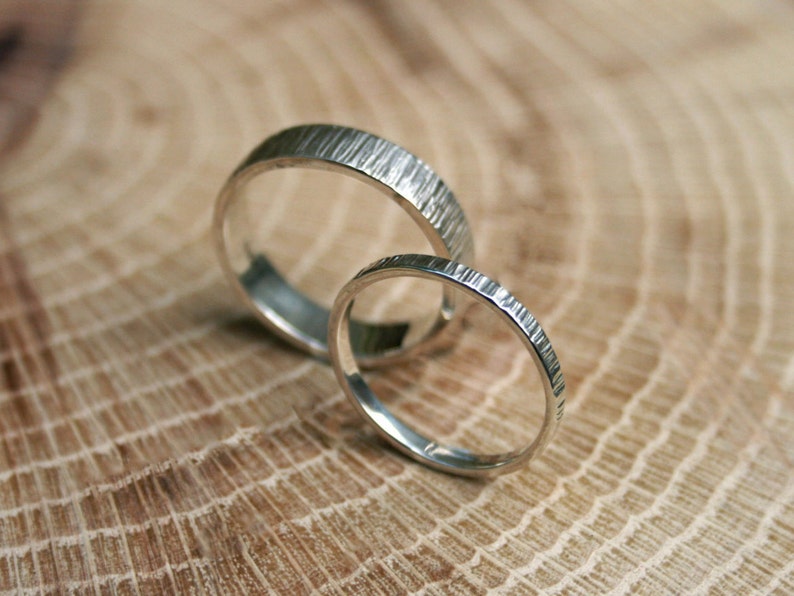 Handmade, sterling silver, wedding ring set featuring a tree bark texture. By Curious Magpie Jewellery.