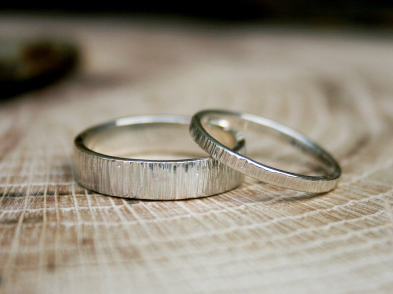 Handmade, sterling silver, wedding ring set featuring a tree bark texture. By Curious Magpie Jewellery.