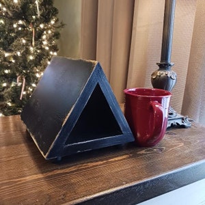 Verontruste zwarte boekenhouder, leesaccessoire en opberger