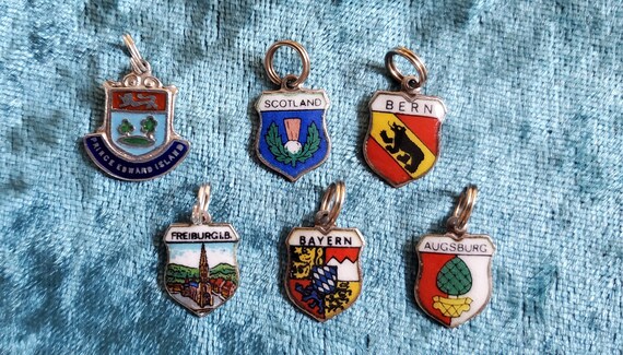 Vintage travel shield charms sale