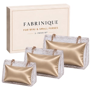 May include: A three-piece set of clear acrylic display stands for mini and small purses, each featuring a gold satin pillow and gold chain accents. The packaging box is labeled FABRINIQUE FOR MINI & SMALL PURSES 3 - PIECES SET.