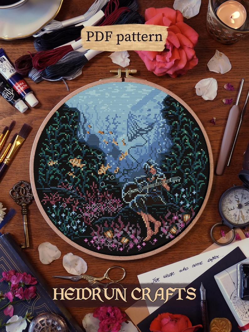 Lune sitting on a rock playing guitar underwater, surrounded by coral and glowing flowers. Fantasy cross stitch pattern inspired by a game scene
