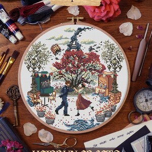 Gustave and Sophie characters from Clair Obscur : Expedition 33. French game of the year. Display of the finished fan art embroidery on a white aida cloth. Cross stitch pattern in PDF format of this memorable dance scene.