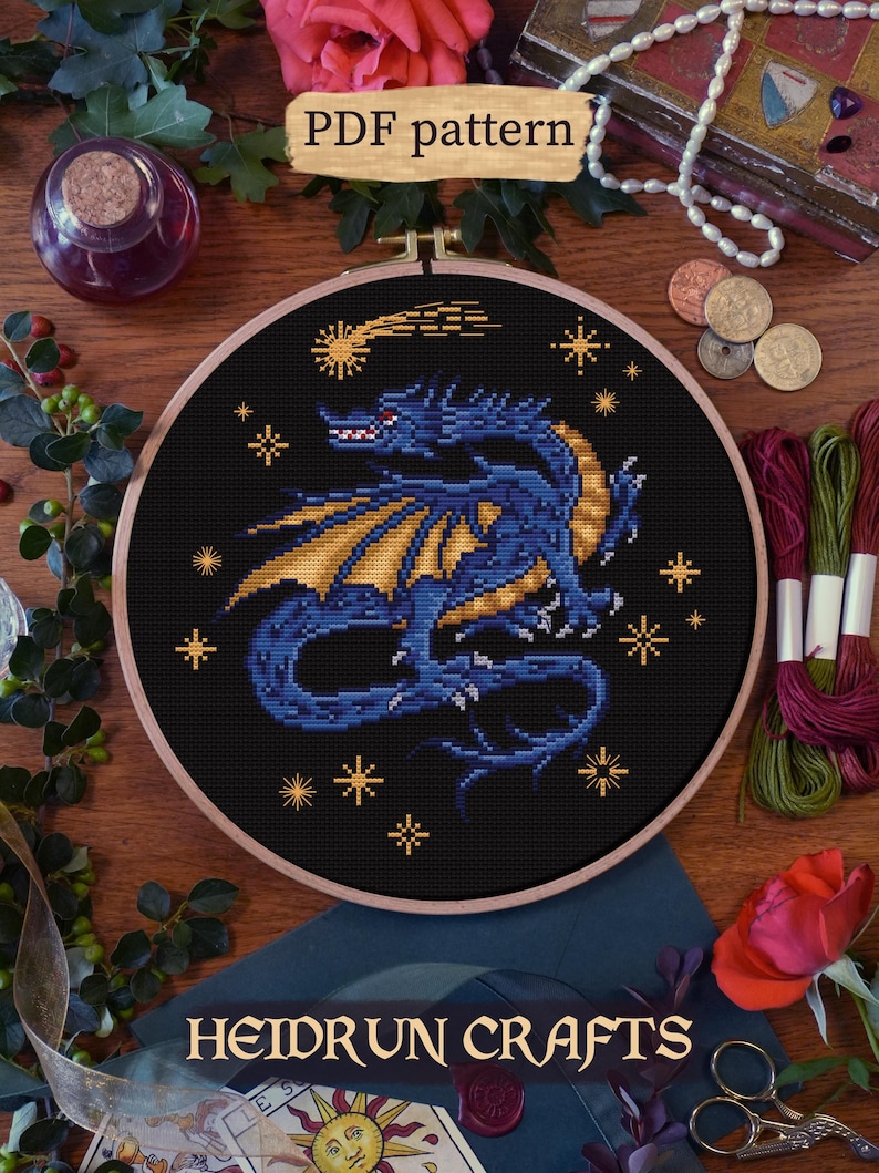 Fantasy cross-stitch pattern with a heraldic dragon, available in blue, red, and green variations. Perfect for castlecore and medieval decor.