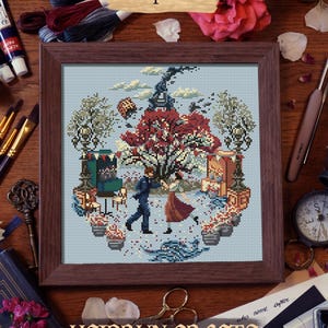 Finished embroidery displayed in a wooden frame of the Gustave and Sophie cross stitch pattern. Inspired by a dance scene in Clair Obscur : Expedition 33 game of the year.  Perfect decoration for a gaming room, a streamer, a crafting corner for fans of the game E33.