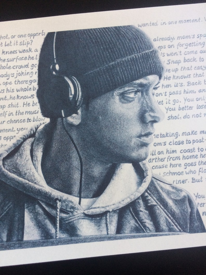May include: A black and white pencil drawing of a man wearing a hooded sweatshirt and a beanie. He is wearing headphones and looking off to the side. The drawing is on a white background. The text "wanted in one moment. L already, mom's spa eps on forgetting Is won't come ou Snap back to re up that easy He knows that hen it's. Back t on't pass him, an 'et it go. You onl You better lose shot, do not r metaking, make me om's close to post- ill on him coast to arther from home he cause here goes the schmoe who flo riner. But You Ater n" is written on the right side of the drawing.
