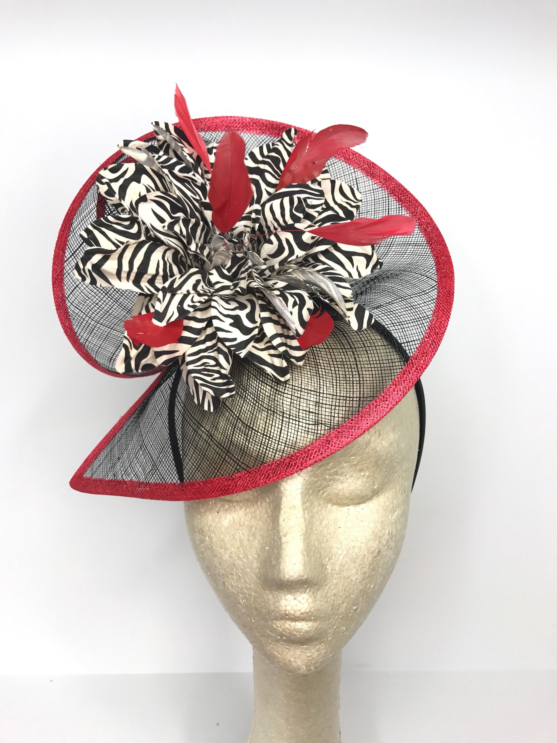red and black hats and fascinators