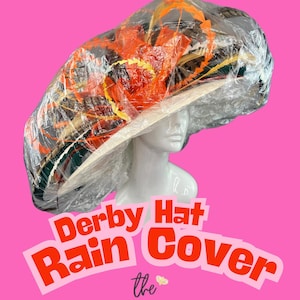 May include: A clear plastic rain cover for a large, colorful derby hat. The cover is designed to protect the hat from rain and other elements. The text on the image reads "Derby Hat Rain Cover the HAT HIVE".