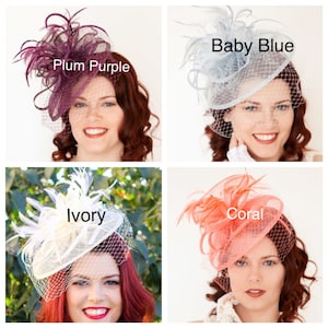 May include: Four different fascinator hats in plum purple, baby blue, ivory, and coral. Each hat features a netting veil and decorative feathers. The hats are displayed on a woman.