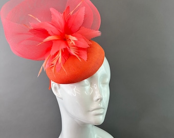 Coral pink Fascinator hat Women's formal event headpiece perfect for the Kentucky derby horse races fashion fascinator for high tea parties