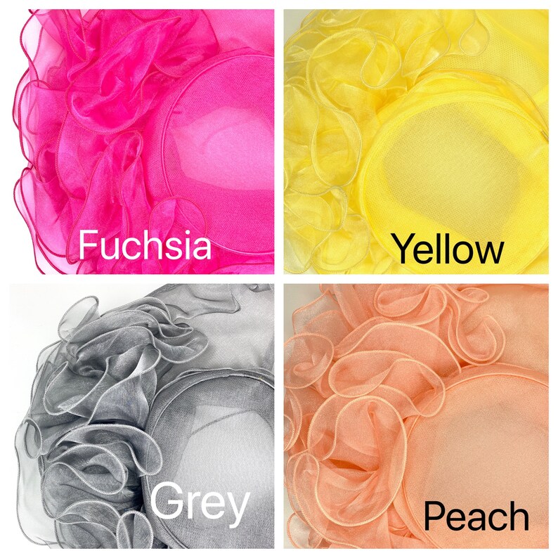 May include: Four different colored hats made of ruffled fabric. The hats are fuchsia, yellow, grey, and peach.