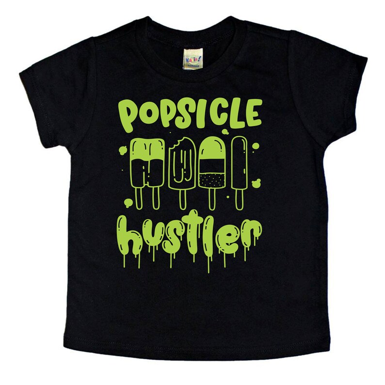 May include: Black t-shirt with a green graphic of popsicles and the text "Popsicle Hustler".