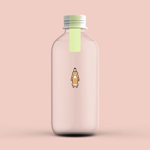 May include: A clear glass bottle with a white lid and a yellow label. A cartoon dog is printed on the bottle.