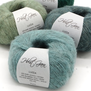 Stickgarn Holst Garn Lucia i babyalpacka, mullbärssilke, merinoull och jakull, mjukt och lätt, 25 g - 200 m / 219 yards