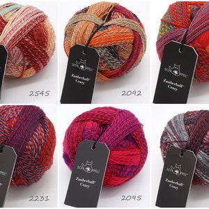 May include: Six balls of colorful yarn with black tags that say "Schappel Zauberball Crazy" and a number. The yarn is a mix of red, orange, green, purple, gray, and white.