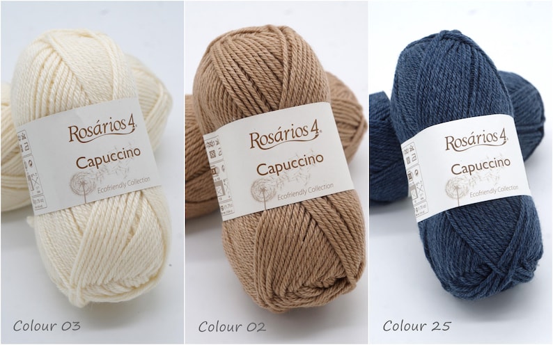 May include: Three balls of yarn in different colours: white, brown, and blue. Each ball has a label that reads "Ros&aacute;rios 4 Capuccino Ecofriendly Collection".