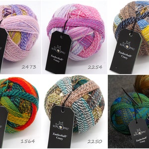 May include: Six balls of yarn in various colors and patterns, including pink, purple, yellow, blue, green, and brown. Each ball has a black tag with the text "Schoppel Zauberball Crazy" and a number.