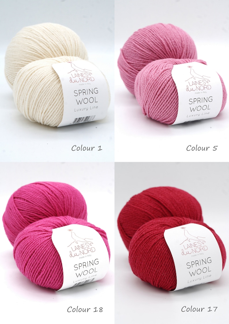 May include: Four skeins of yarn in different colors: white, light pink, hot pink, and red. Each skein has a label that says "Laines du Nord" and "Spring Wool Luxury Line".