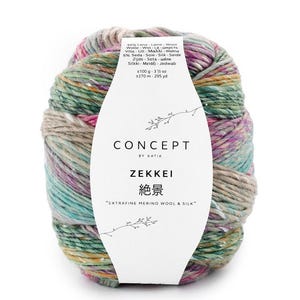 May include: A ball of Zekkei yarn by Katia, featuring a blend of extrafine merino wool and silk. The yarn is a mix of green, pink, and blue. The label reads "EXTRAFINE MERINO WOOL & SILK". The ball weighs 100g.