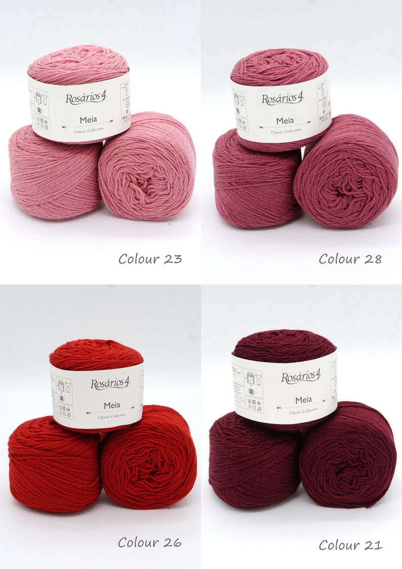 May include: Four balls of yarn in different shades of pink and red. The yarn is labeled "Ros&aacute;rios 4 Meia Classic Collection".