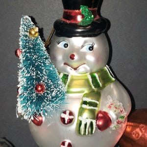 Glass Snowman Holding Bottle Brush Tree Christmas Ornament Holiday Decoration