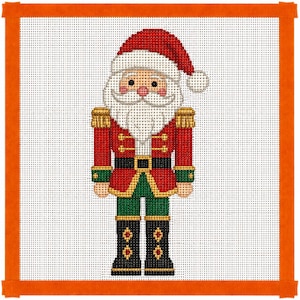 May include: A needlepoint canvas featuring a Santa Claus nutcracker design. The figure wears a red hat with a white pom-pom, a red jacket with gold trim, a black belt, green trousers, and black boots with gold and red diamond-shaped accents.