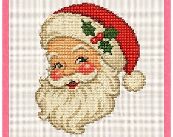 May include: A needlepoint canvas featuring a Santa Claus head with a red hat, white fur trim, and a pom-pom. The design includes green holly leaves and red berries on the hat, with a white beard, mustache, and rosy cheeks on a grid.