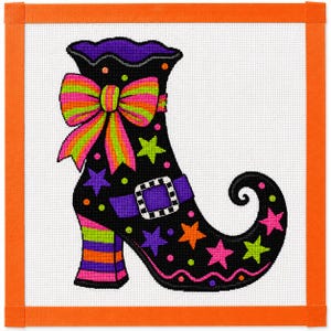 May include: A needlepoint canvas featuring a black witch boot with a curled toe, decorated with neon-colored stars and dots. The boot has a striped heel, a purple buckle strap, and a large, multi-colored striped bow at the top cuff.