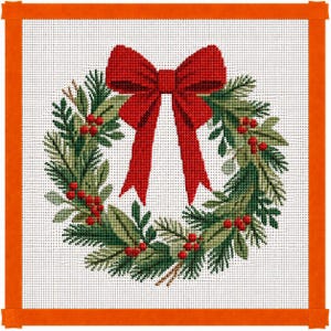 May include: A needlepoint canvas featuring a cross-stitched Christmas wreath design. The wreath is composed of green pine needles and leaves with clusters of red berries, centered with a large, bright red bow with two long hanging tails.
