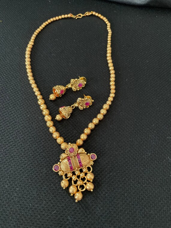 Temple on sale pendant set