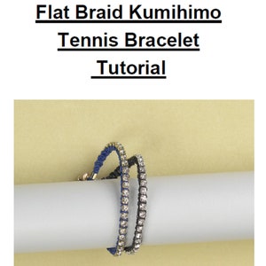 May include: Two bracelets made with a flat braid technique. One bracelet is blue with silver rhinestones and the other is black with silver rhinestones.