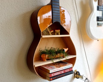 Acoustic guitar upcycled bookshelf