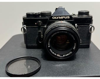 Olympus OM-2 35mm Film Camera W/ 50mm F1.8 Zuiko Lens