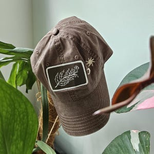 Cosmic Forager Baseball Hat - Embroidered vintage-look hat with fern, mushrooms, sun moon motifs