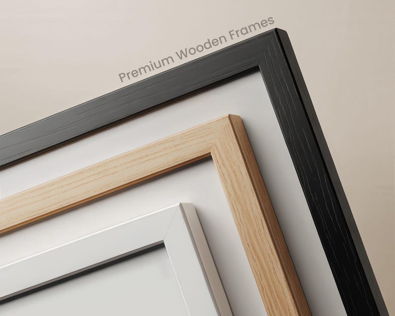 three different wooden frames, each with a unique color and design, arranged in a row.