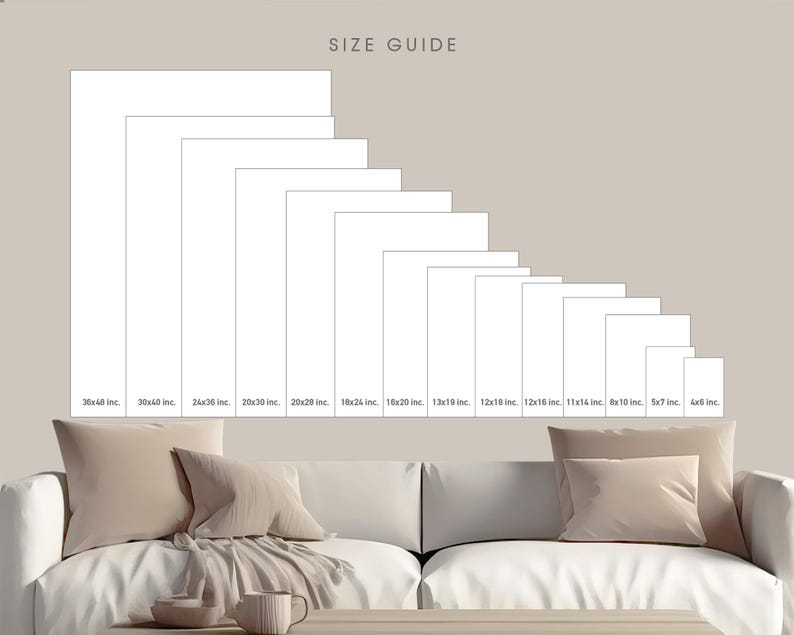 a white couch sitting next to a coffee table