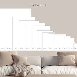a white couch sitting next to a coffee table