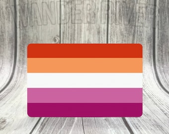 May include: A lesbian pride flag with six horizontal stripes in the colors red, orange, white, pink, light purple, and dark purple.