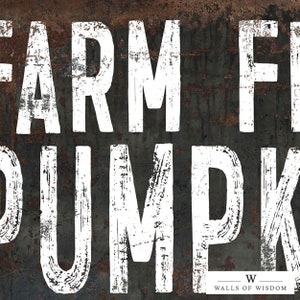 May include: White distressed text on a rusty metal background reads "FARM FRESH PUMPKIN" with a small logo at the bottom that reads "WALLS OF WISDOM".