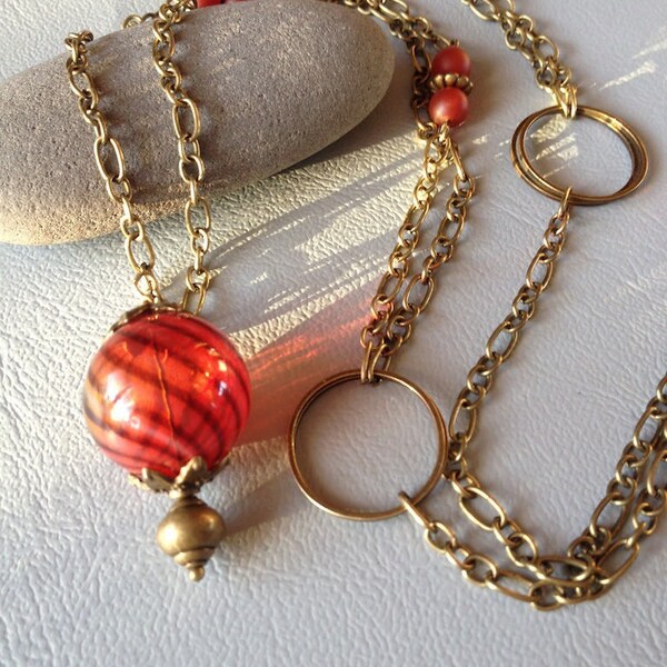 long necklace, double row chain, brick red blown glass bubble bead, red agate, light, rings, bronze metal beads, fine stones