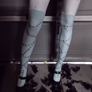 Blue Thigh highs with black bow and stitches