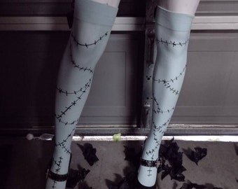 Blue Thigh highs with black bow and stitches