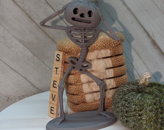 Más allá del muro del jardín, esqueleto de calabaza, modelo de esqueleto, calabaza, esqueleto OTGW, calabaza OTGW, arte OTGW, escultura sobre el muro del jardín