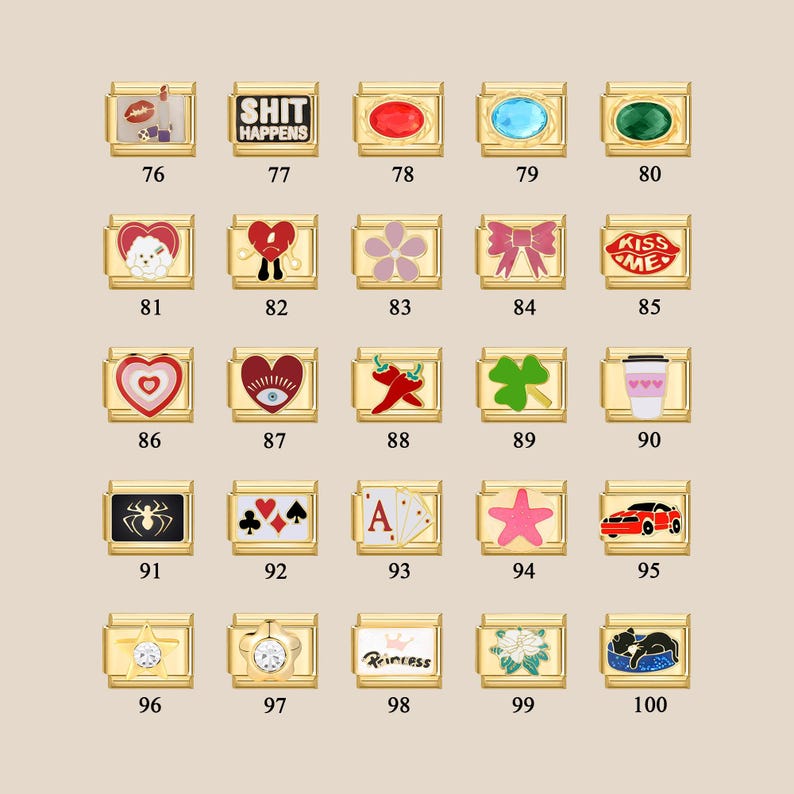 May include: A set of 100 gold-toned charms with various designs, including hearts, stars, animals, and words. The charms are arranged in a grid pattern on a white background.