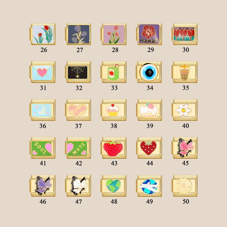 May include: A set of 50 gold-toned charms with various designs, including flowers, hearts, butterflies, and other symbols. The charms are arranged in a grid pattern on a white background.