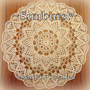 May include: A beige crochet doily with a sunburst design. The doily is on a wooden surface. The text "~Sunburst~" and "Instant PDF Download" is on the image.