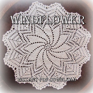 May include: A white crochet doily with a spiral design. The doily is called "Windflower" and is available as an instant PDF download.